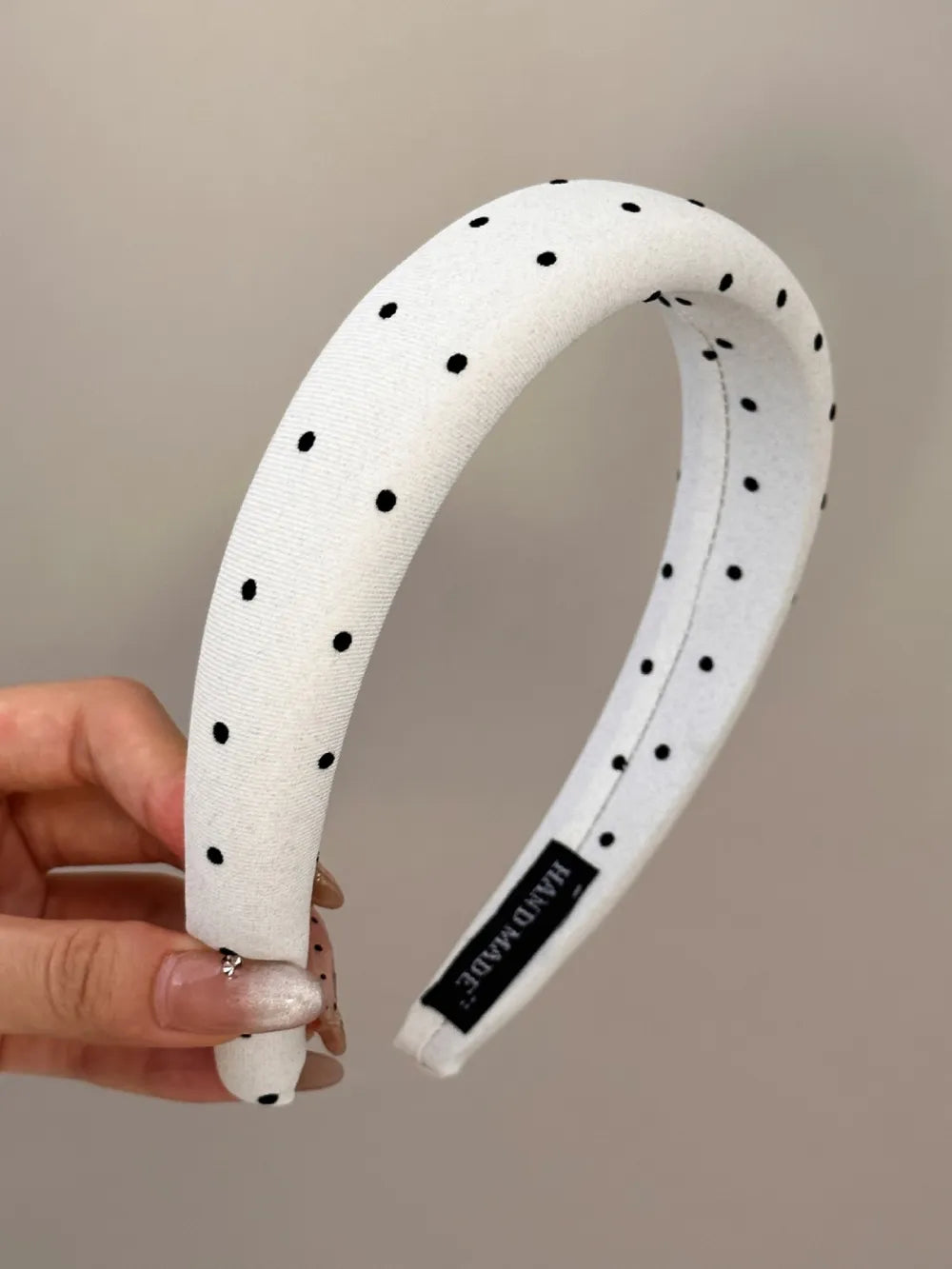 White polka dot wide polyester headband with black dots