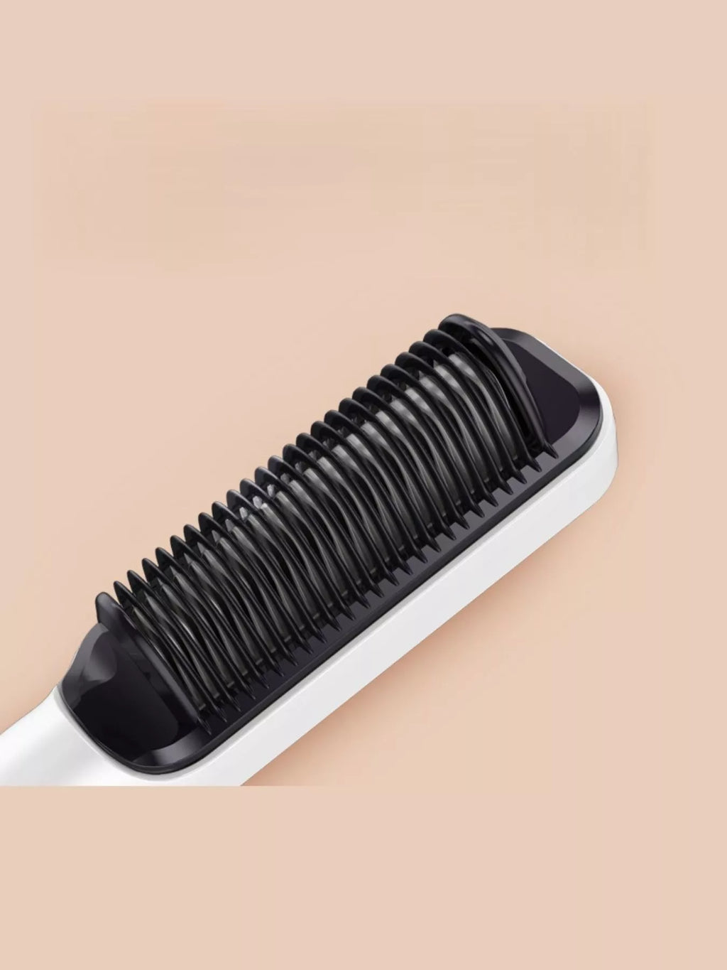 Ceramic straightening comb head with black teeth on a white handle
