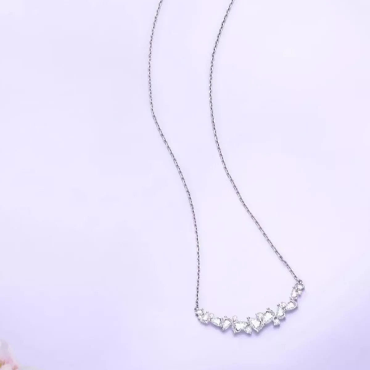 Silver zircon necklace, small linked stones along a delicate chain