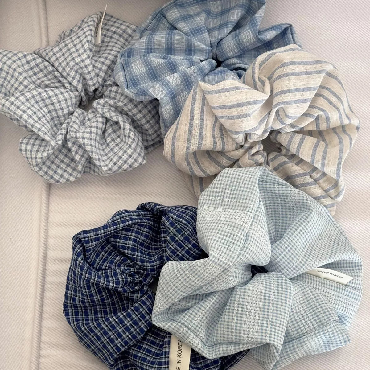 Light blue scrunchie set: blue plaid, light plaid, and stripe scrunchies