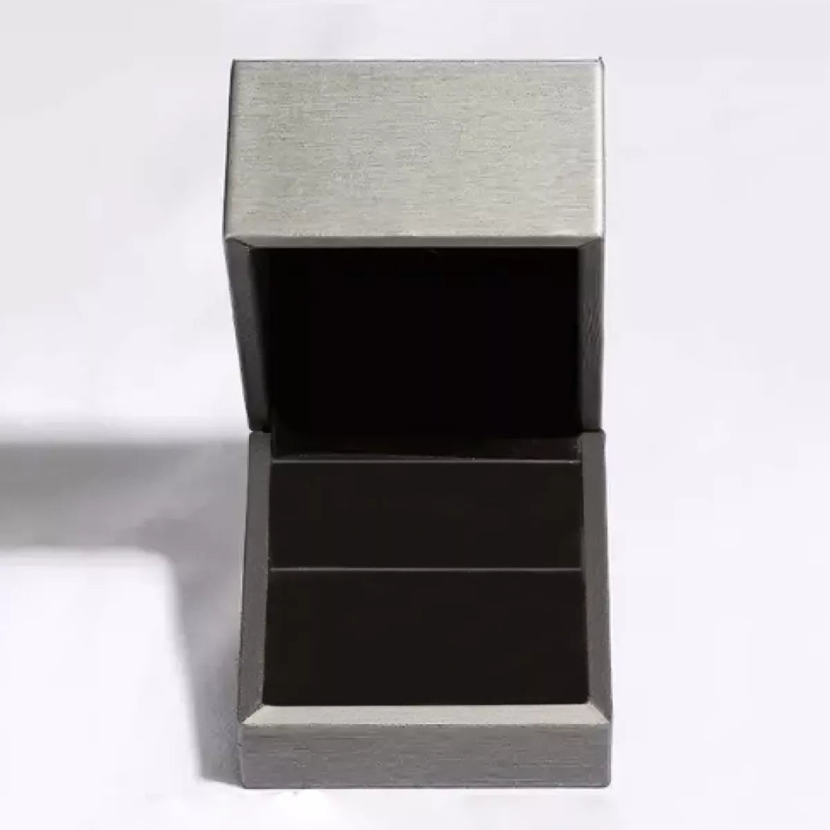 Silver jewelry gift box with black insert for a moissanite ring