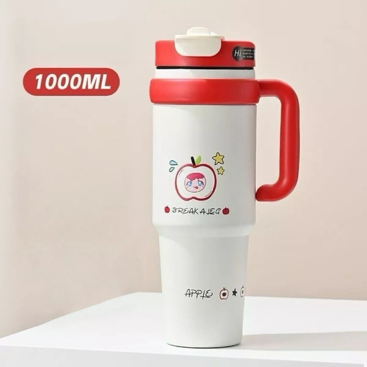 Red 1000ML water bottle with straw, handle, apple graphic and flip lid