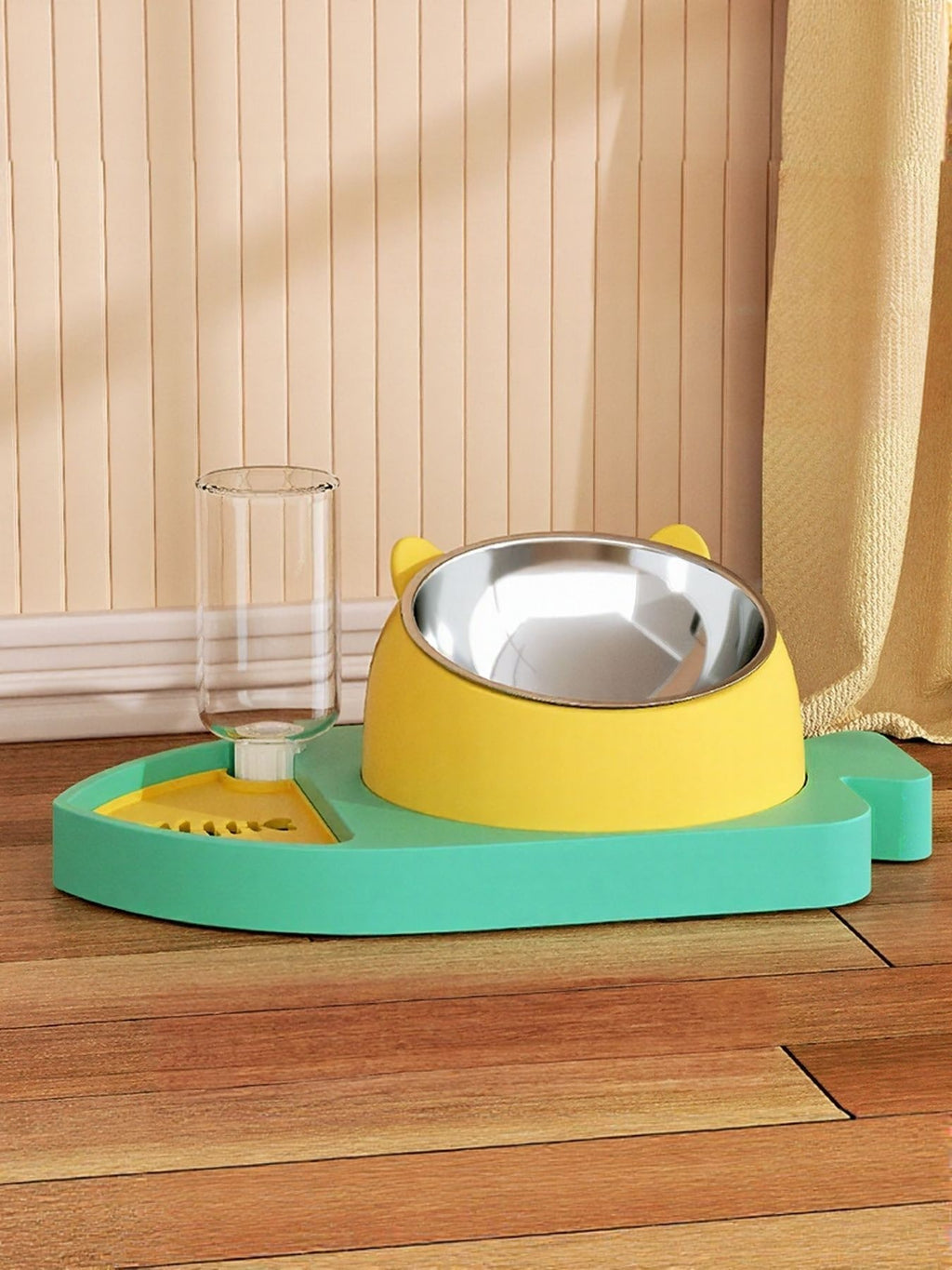 Teal automatic water refill pet bowl with yellow base and stainless drinking bowl