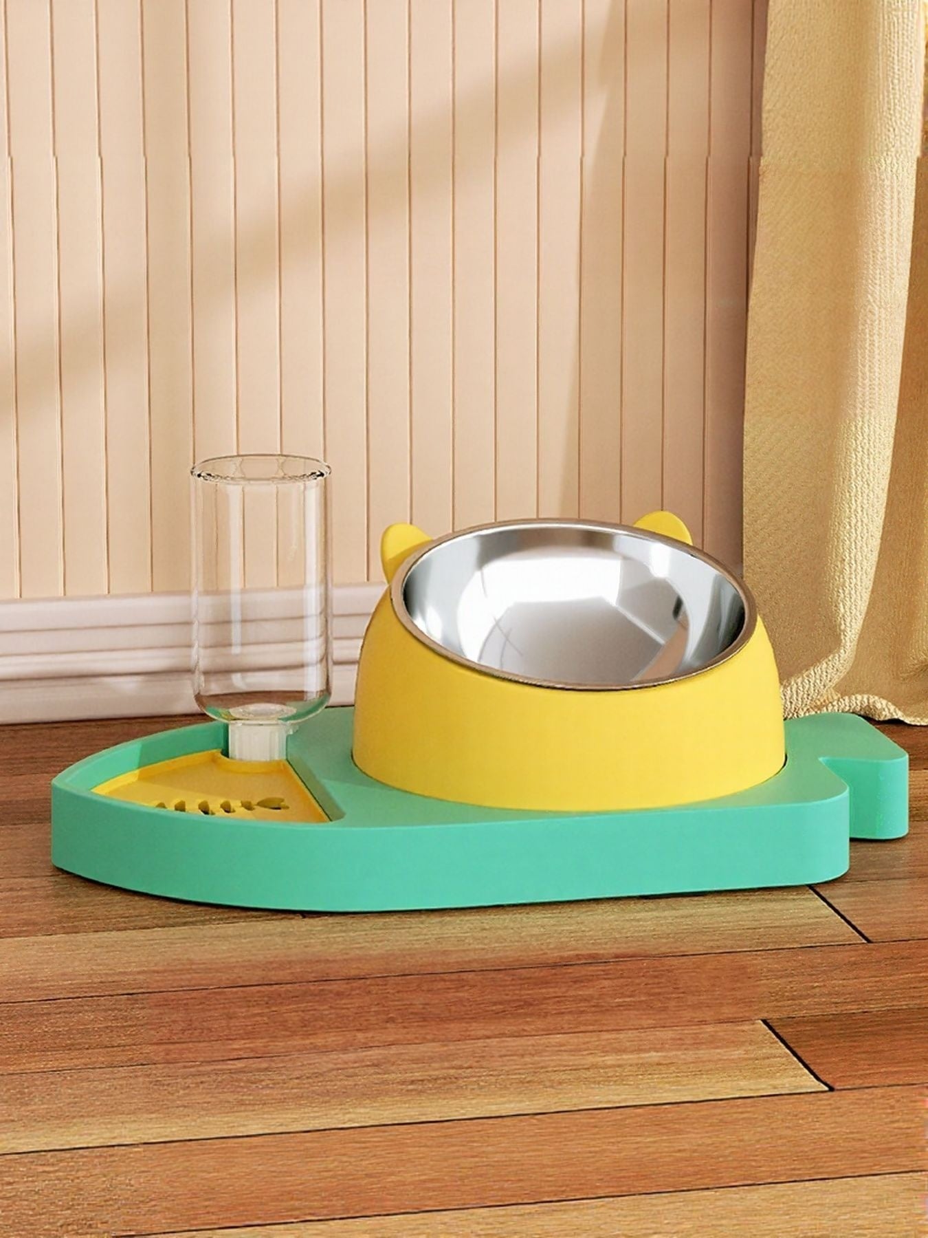 Teal automatic water refill pet bowl with yellow base and stainless drinking bowl