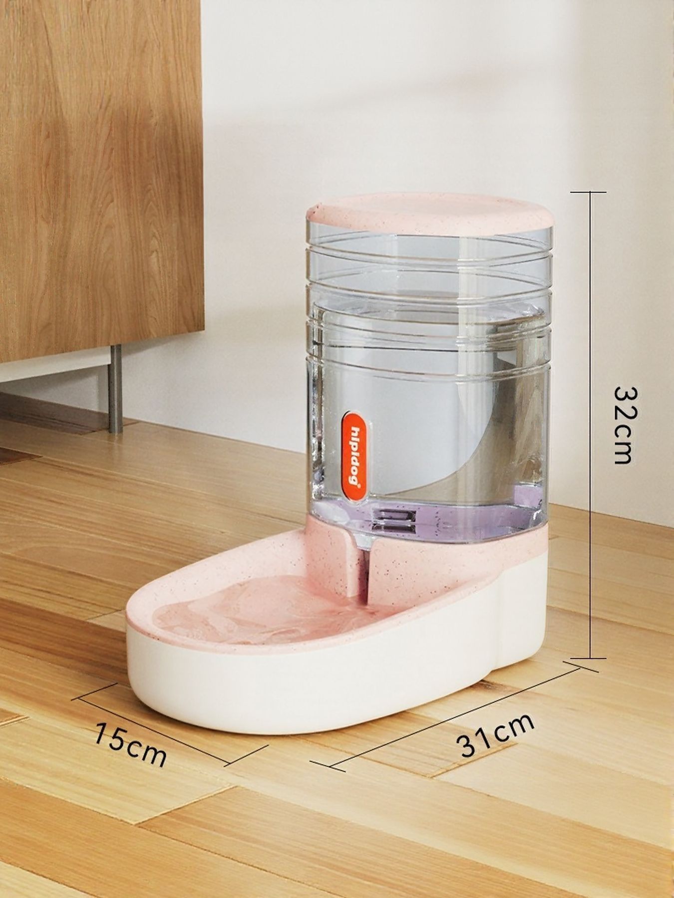 Pastel pink and clear automatic pet water dispenser with closed top and spout