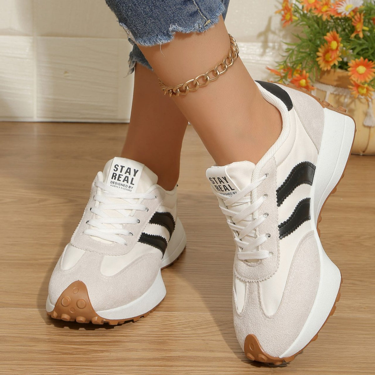 Round toe lace-up sneakers, white with black stripes and tan textured outsole