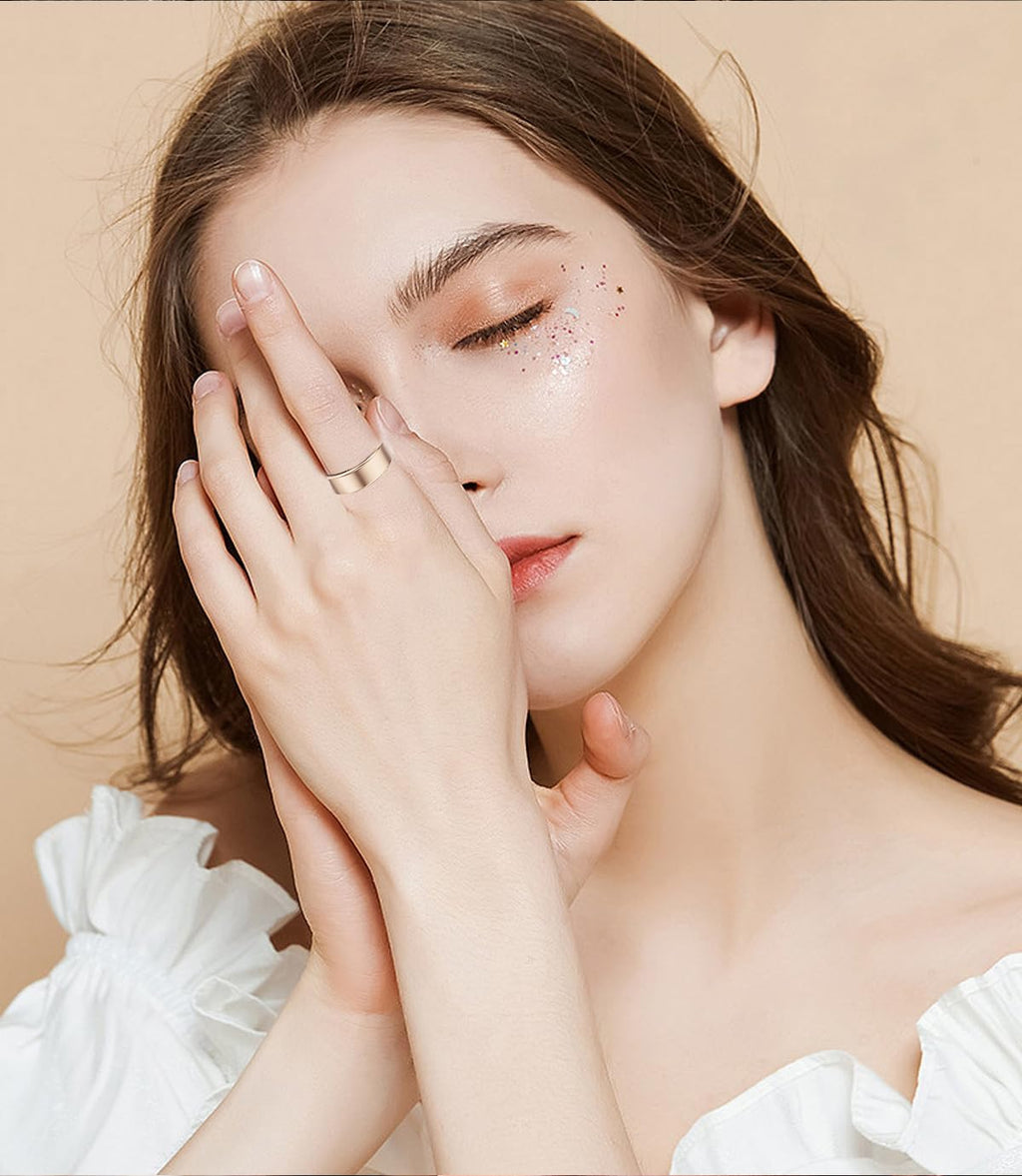 Gold smart ring worn on finger
