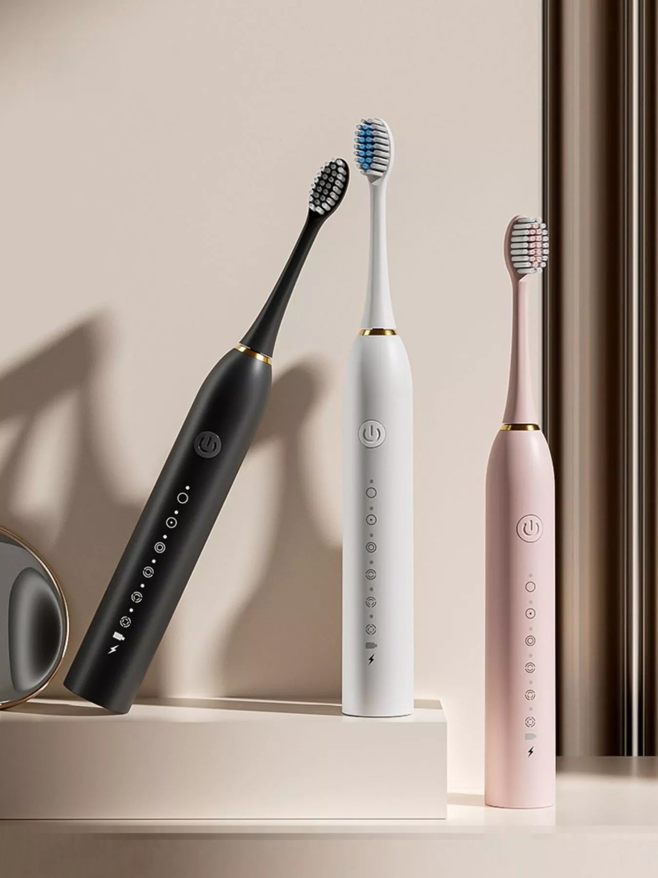 Electric toothbrush set: black, white, and pink handles with multiple modes