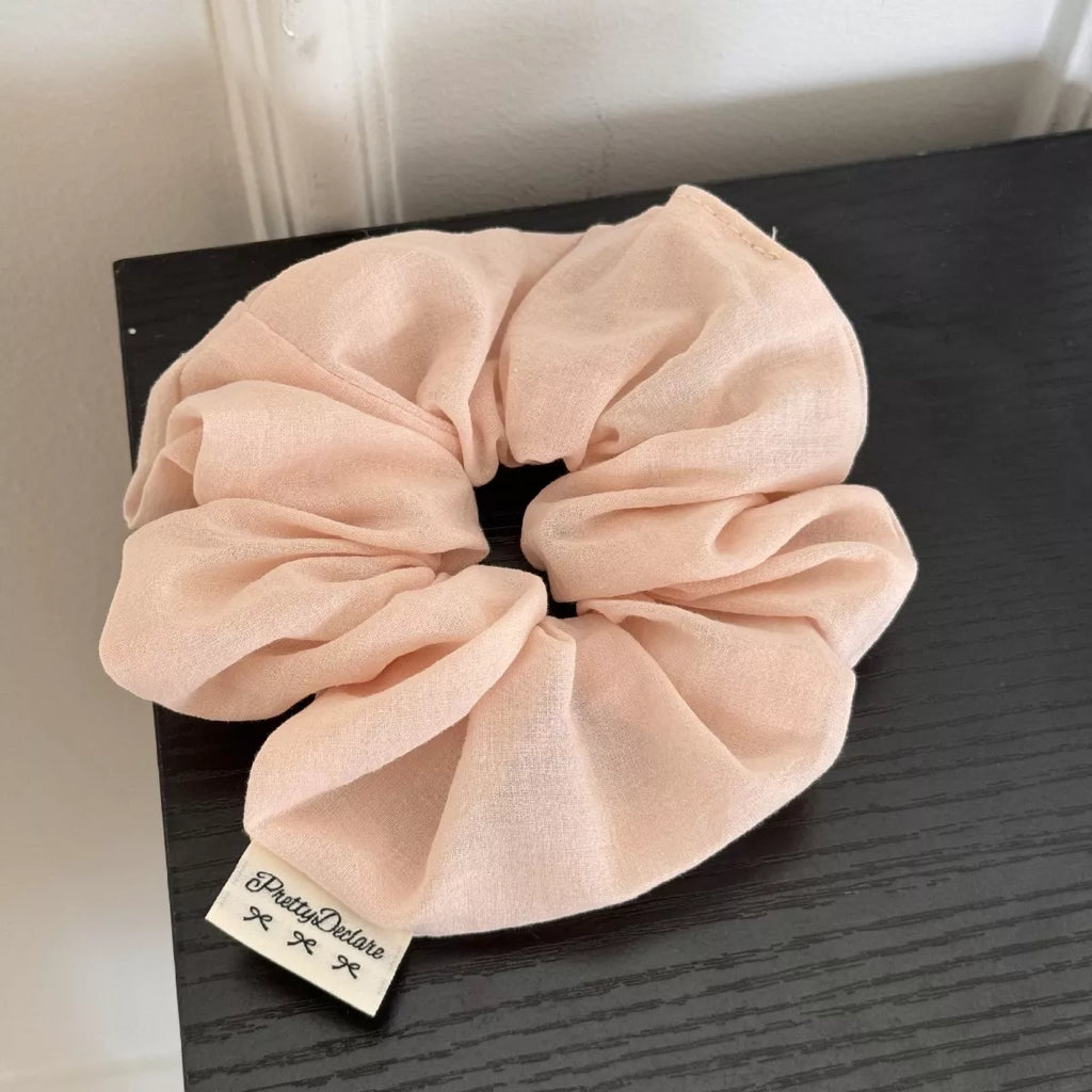 Light blush hair scrunchie in solid soft fabric