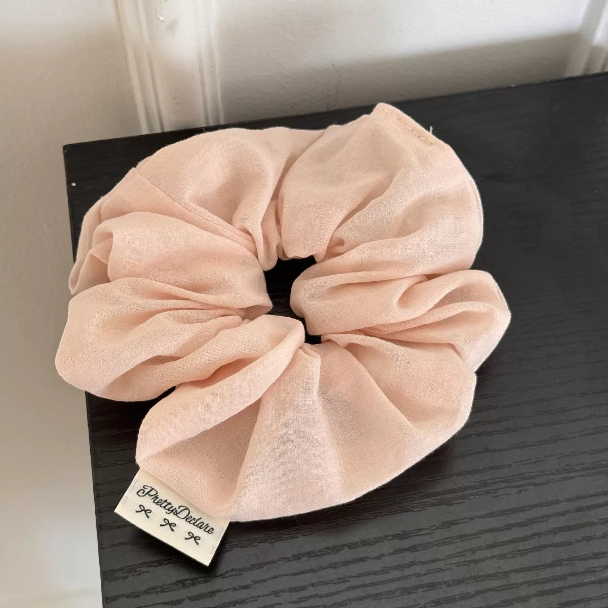 Light blush hair scrunchie in solid soft fabric