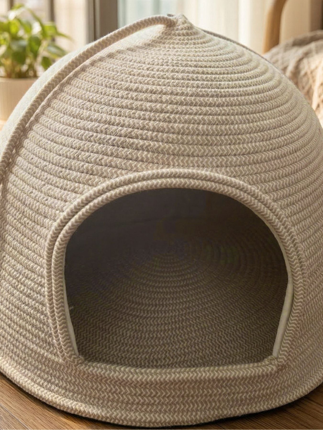 Cream rope dome pet nest fabric walls with oval doorway, no pet inside