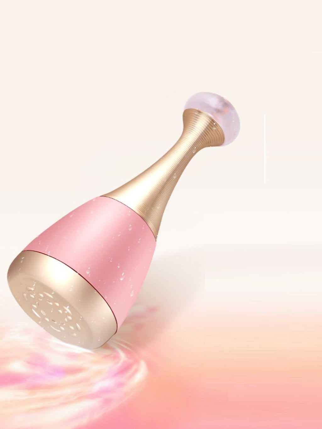 Blush pink facial steamer head emitting visible mist, gold nozzle and white ring
