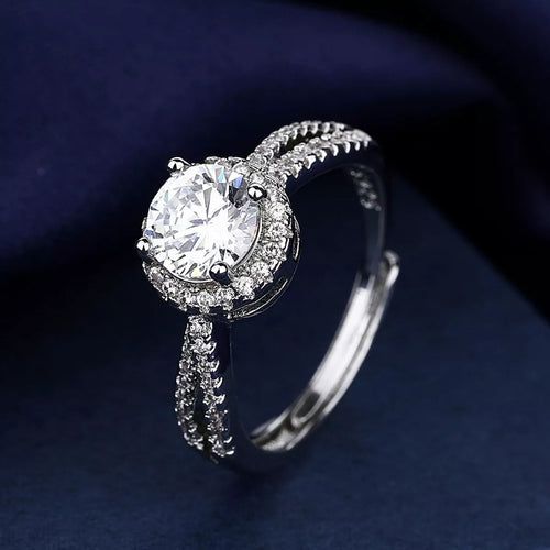 925 sterling silver ring with oval moissanite center and halo of pavé stones