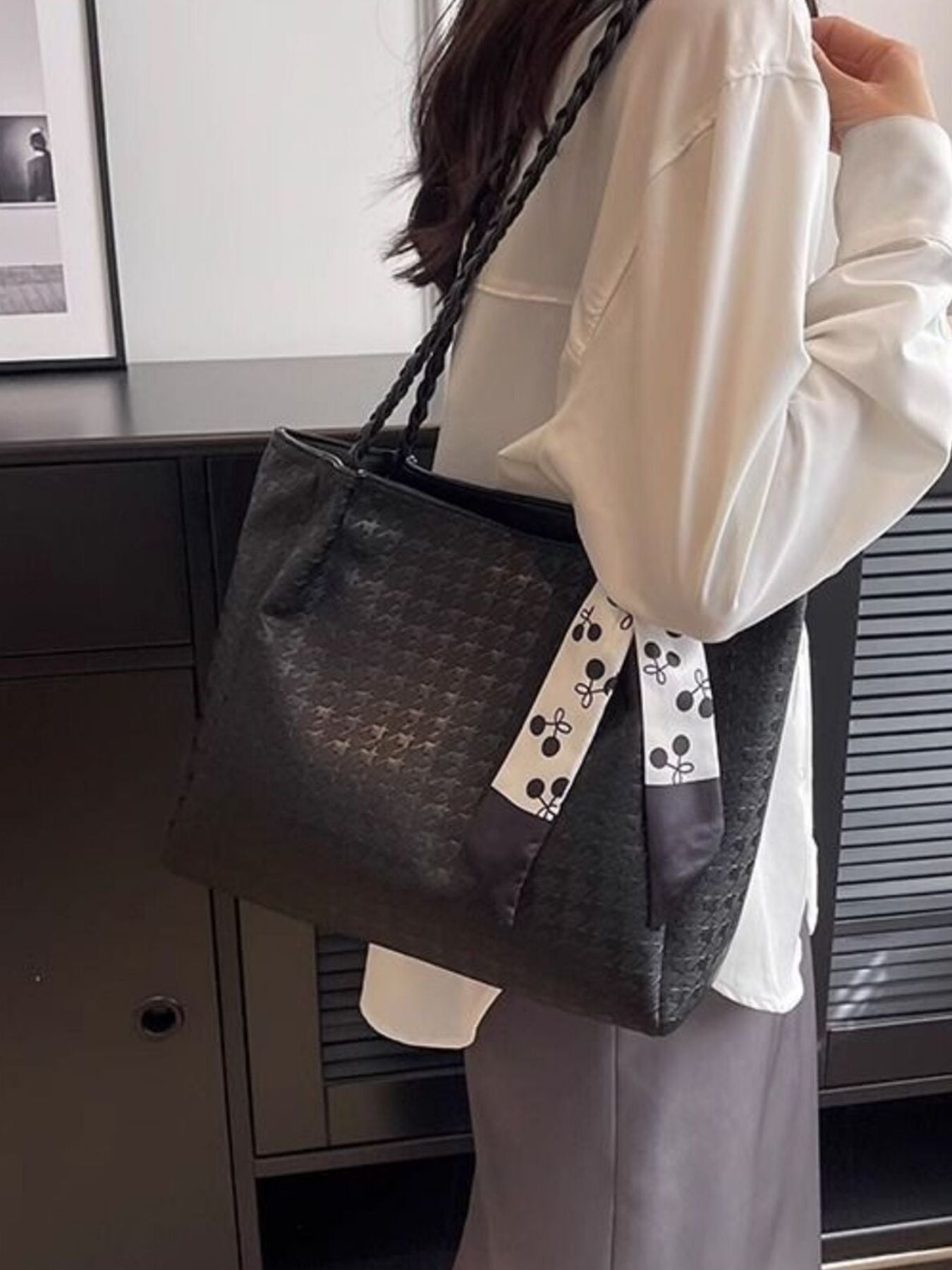 Ivory braided handle tote bag with ribbon bow and textured finish