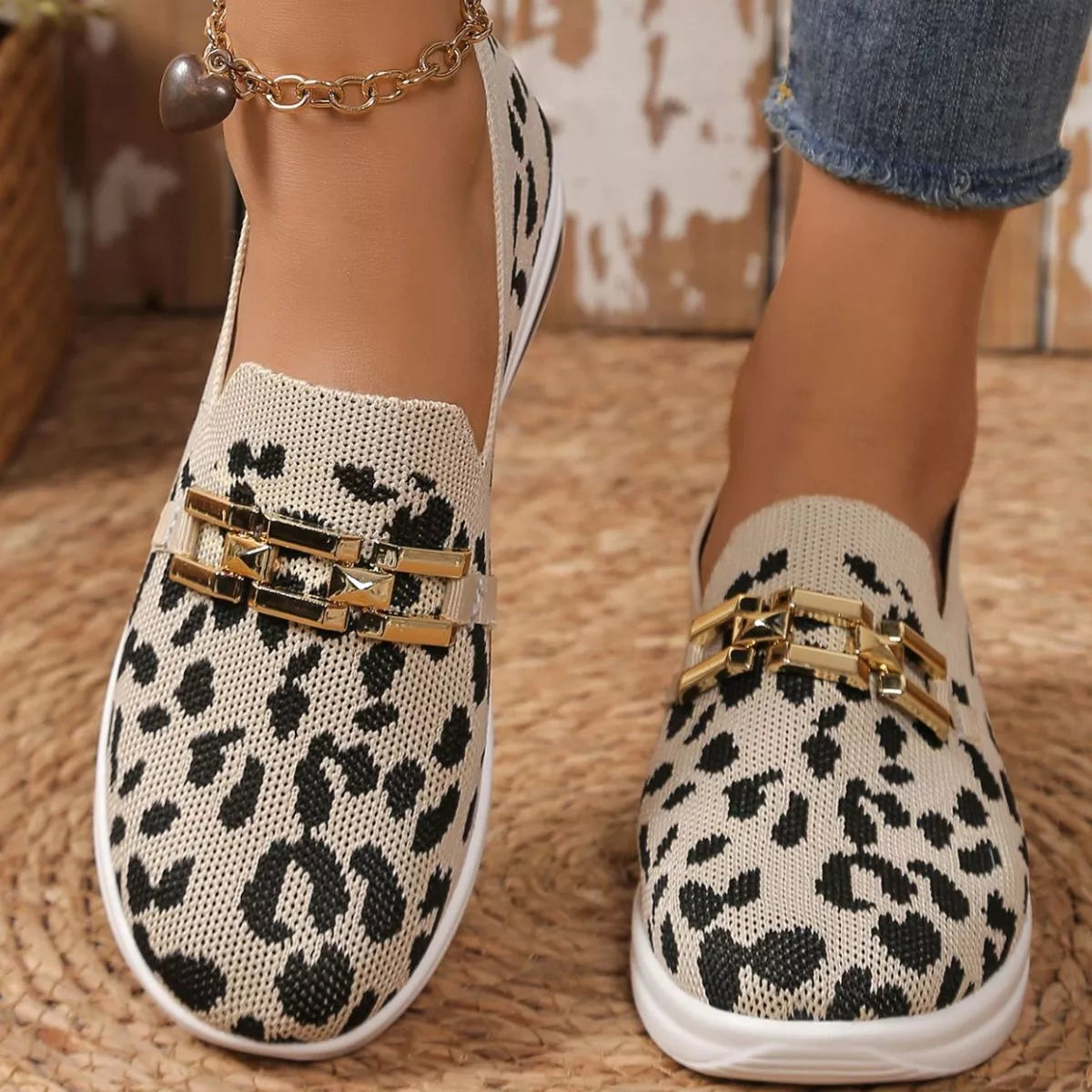Khaki leopard slip-ons with gold buckle strap and ankle bracelet detail