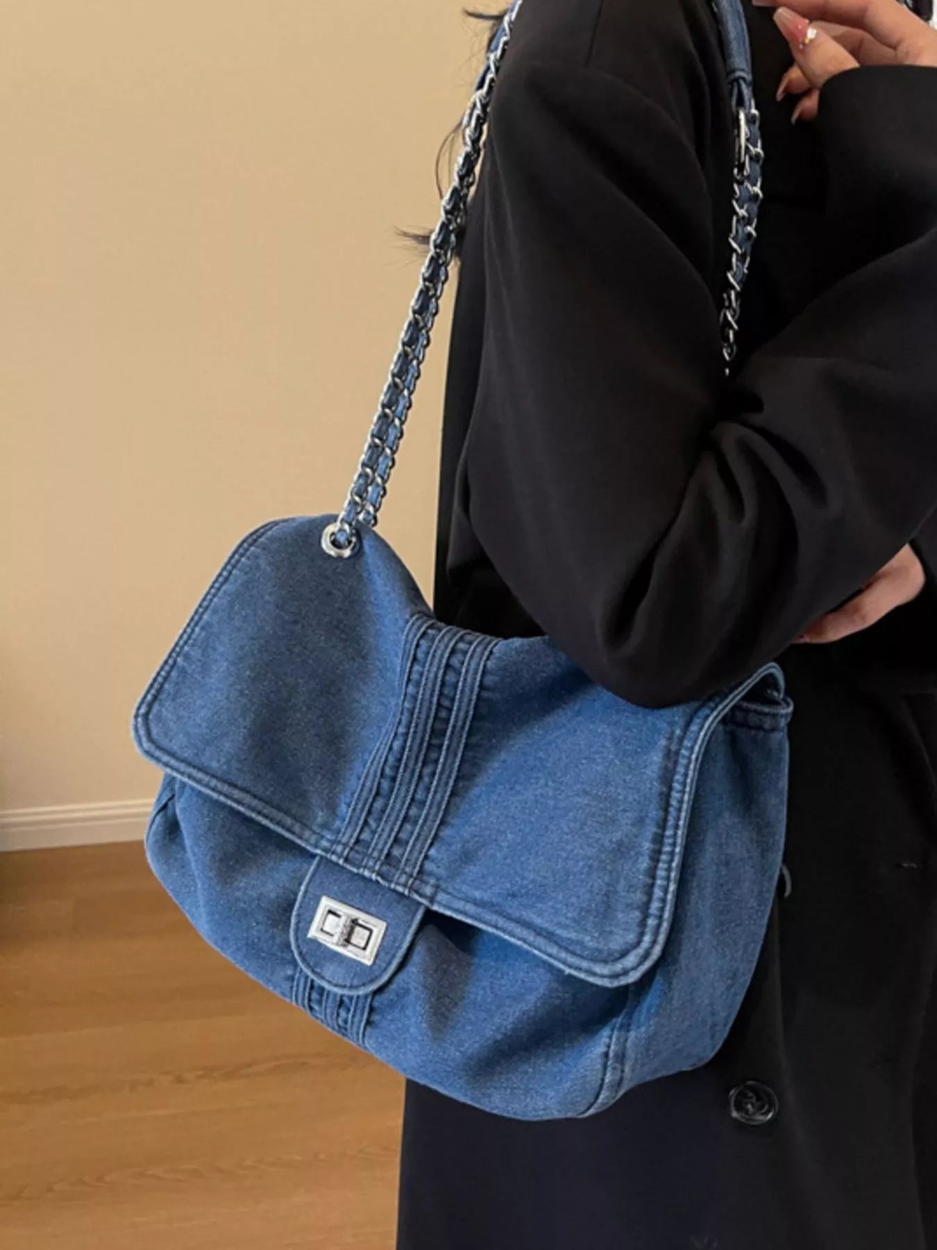 Blue denim flap chain shoulder bag with metal clasp and silver chain strap