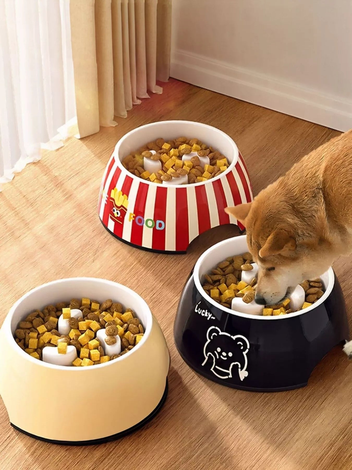 Pet bowls set: black bear design and red striped bowl for food