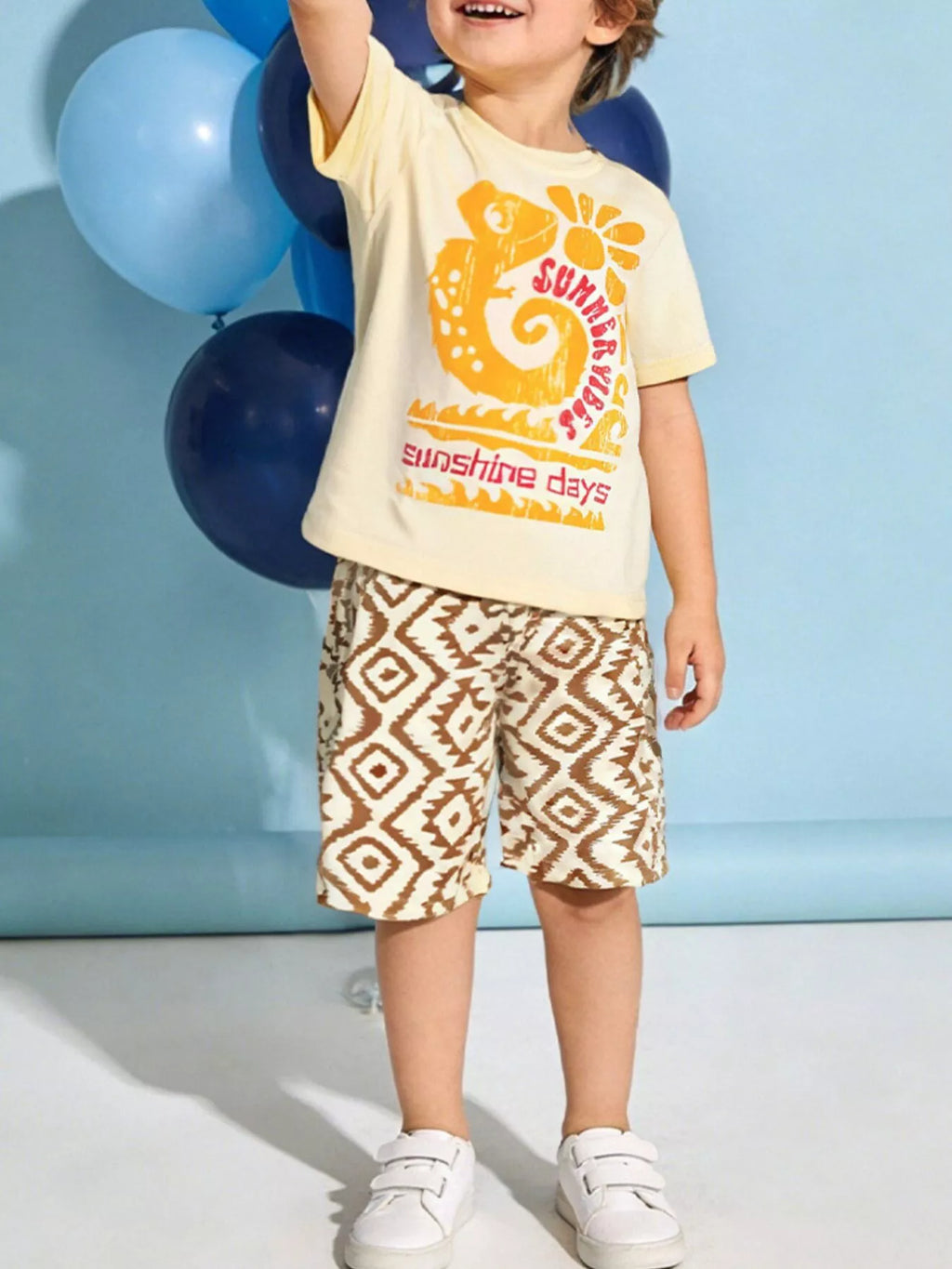 Pastel Yellow kids graphic tee and geometric print shorts set