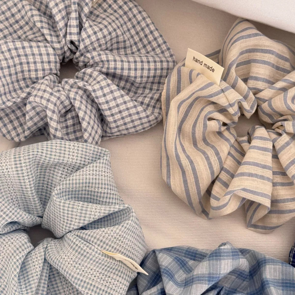 Light blue scrunchie set: gray-blue gingham and blue-striped scrunchies