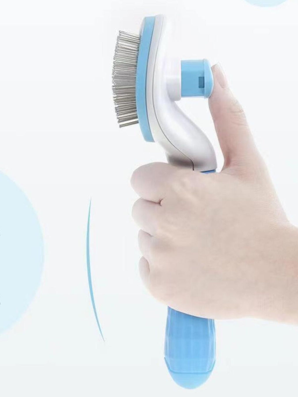 Blue plastic pet hair remover comb with curved head and metal bristles, side view