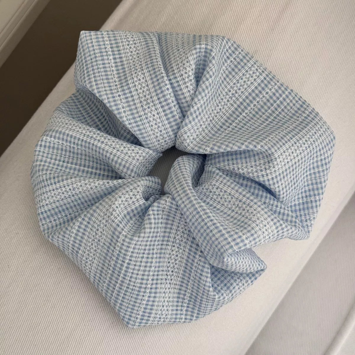Light blue textured check hair scrunchie, tied bow style