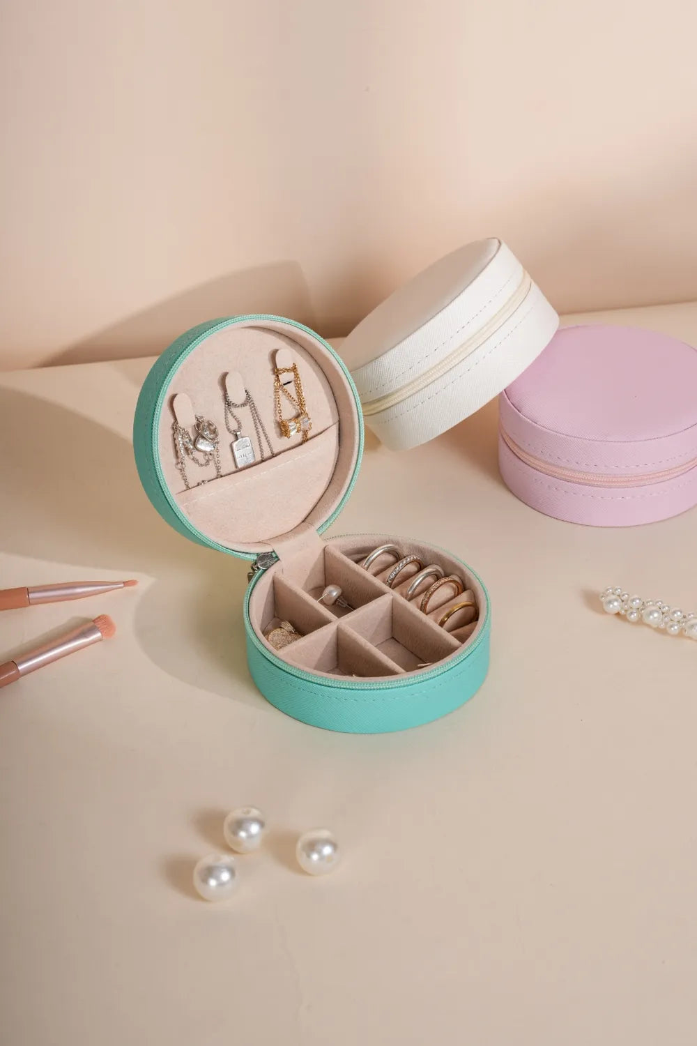 Turquoise PU leather jewelry storage box, round zipper case open with ring and earring slots