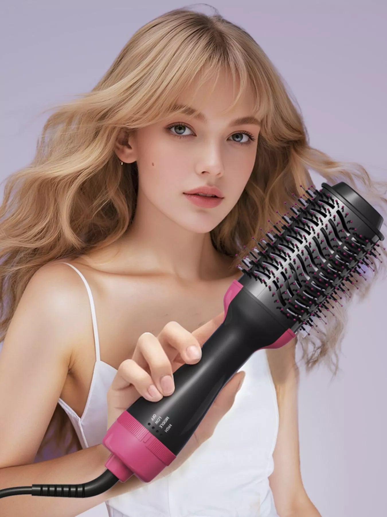 Heißluft-Glättbürste mit schwarzen Borsten und rosa Griff, für glattes Haar