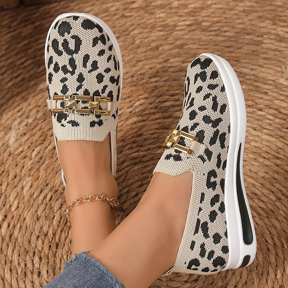 Khaki leopard mesh slip-on sneakers with black spots, gold buckle and white sole