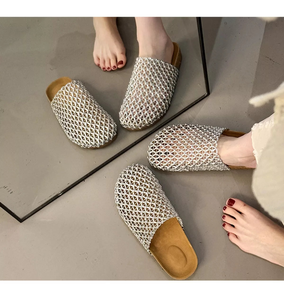 White woven mesh slip-on sandals on feet, open backless clog with cork sole