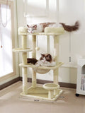 Plush cat tree condo with cream platforms and two scratching posts; soft top perch