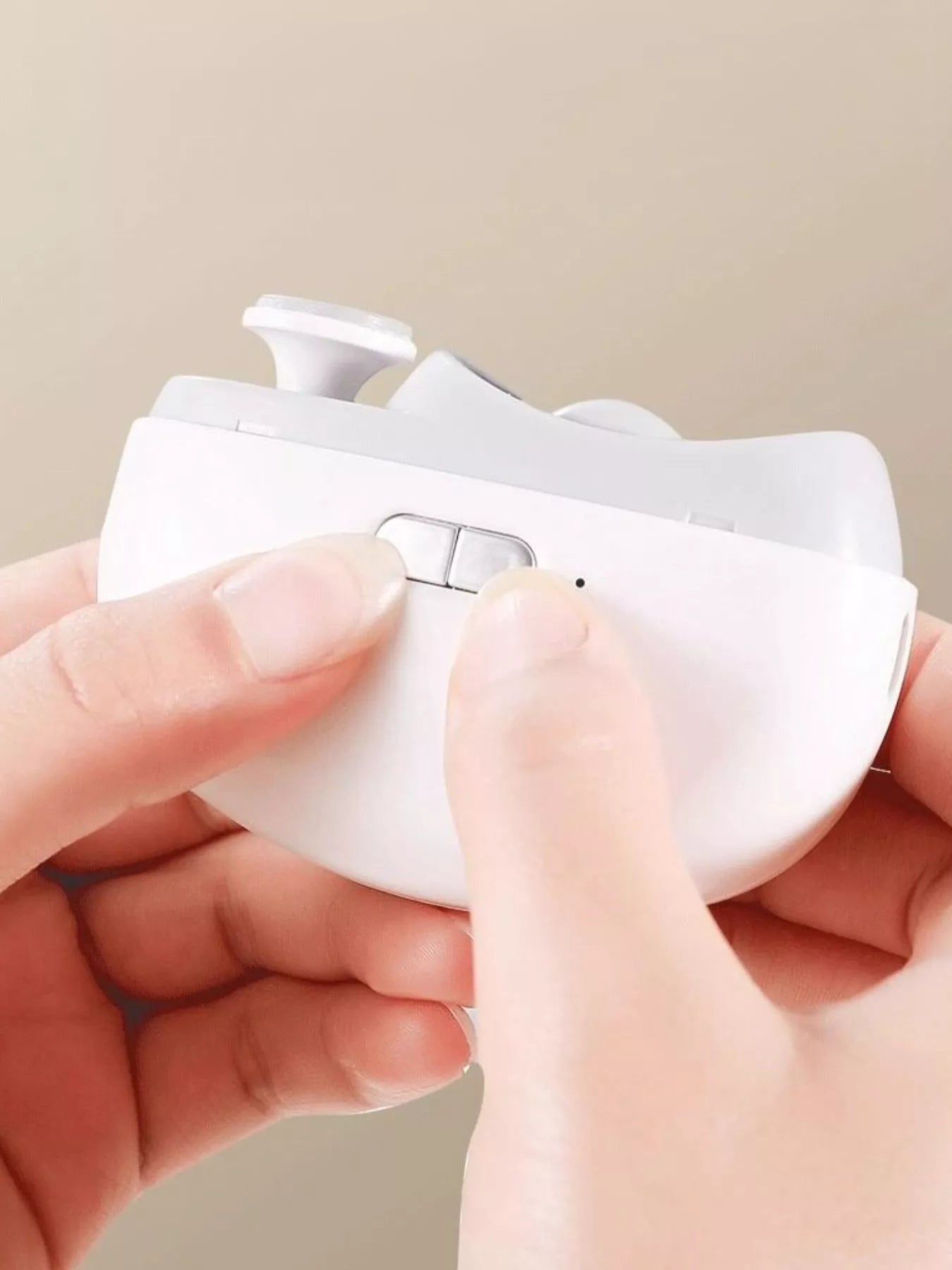 White electric nail buffer with sanding bar and built-in circular pads