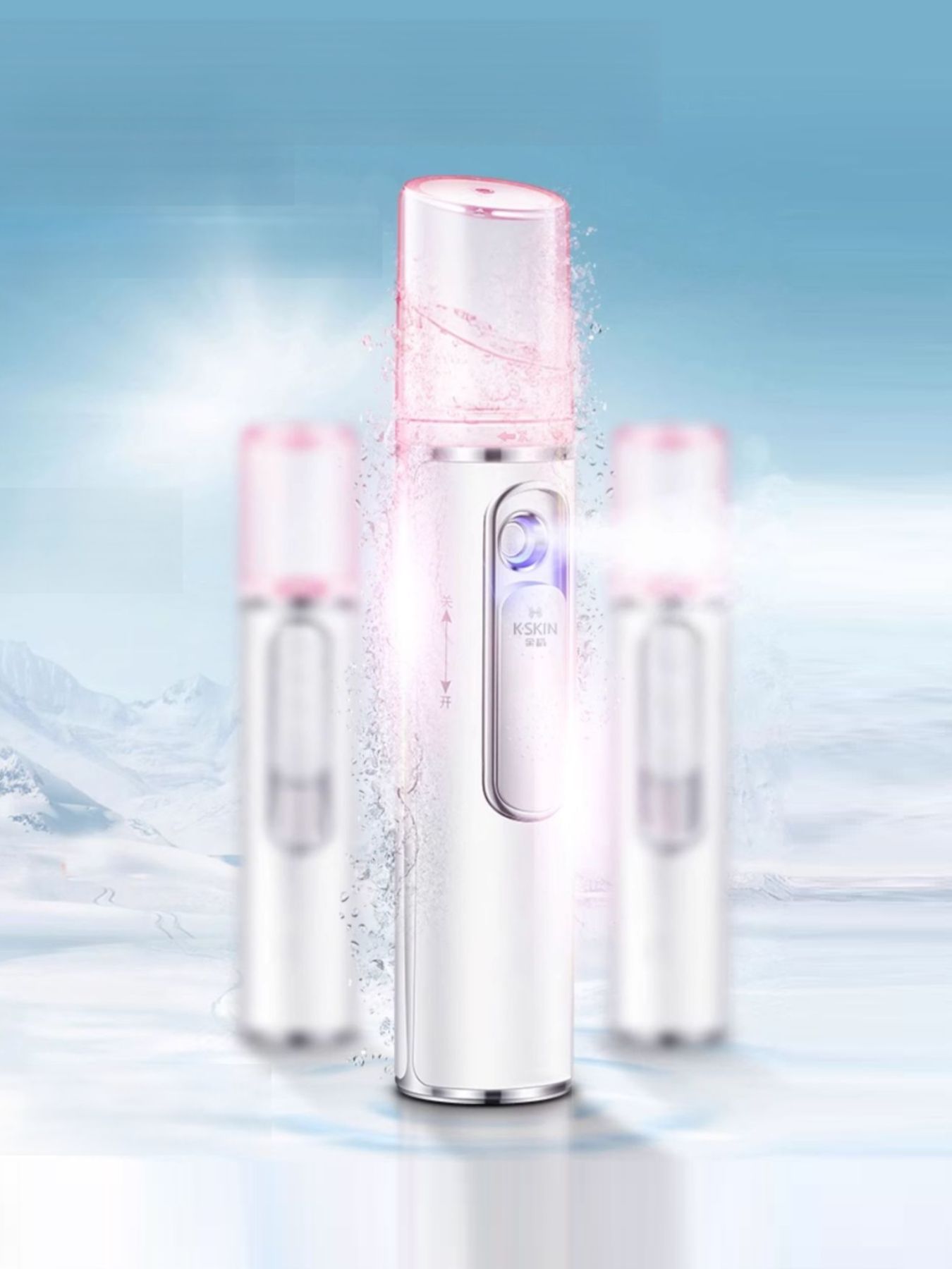 Portable facial mister nano sprayer releasing visible mist from pink nozzle cap