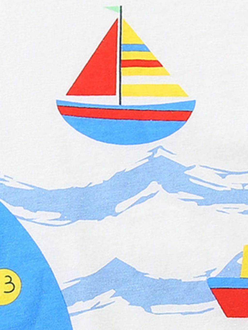 Sailboat print with red sail and striped hull over blue ocean waves on white tee