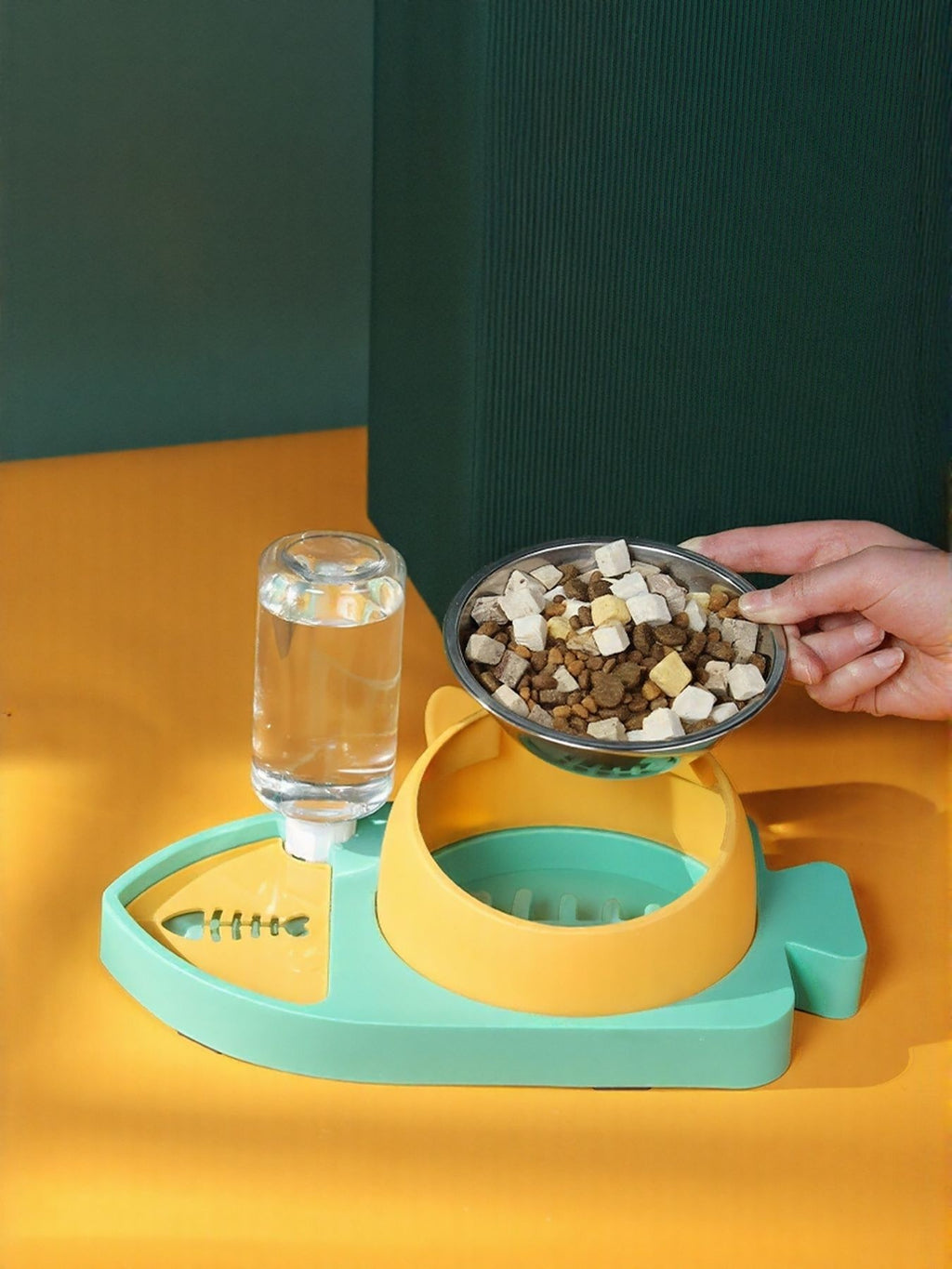 Teal and yellow automatic water refill pet bowl with water bottle, food bowl, and insert