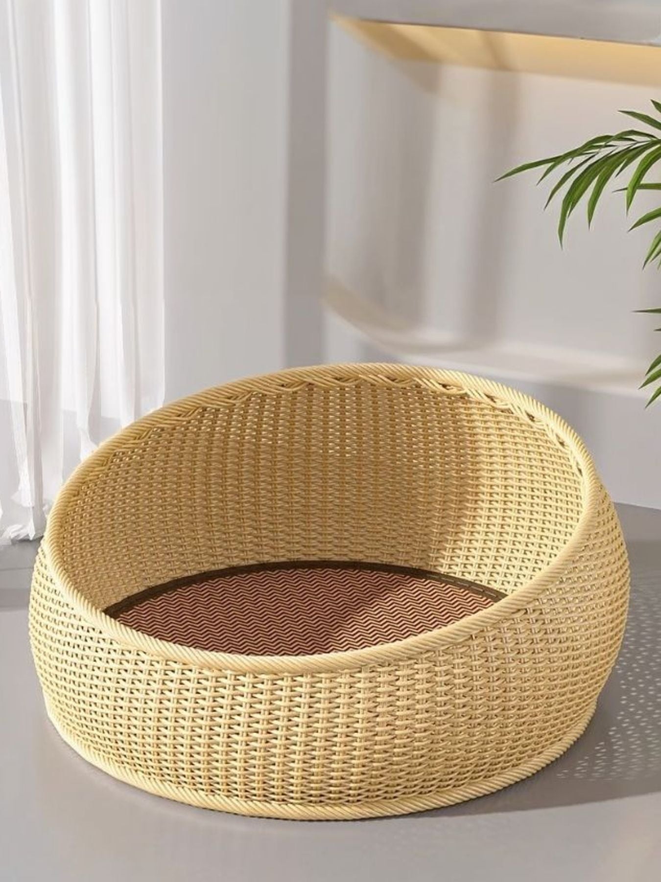 Beige round woven rattan pet nest with zigzag cushion