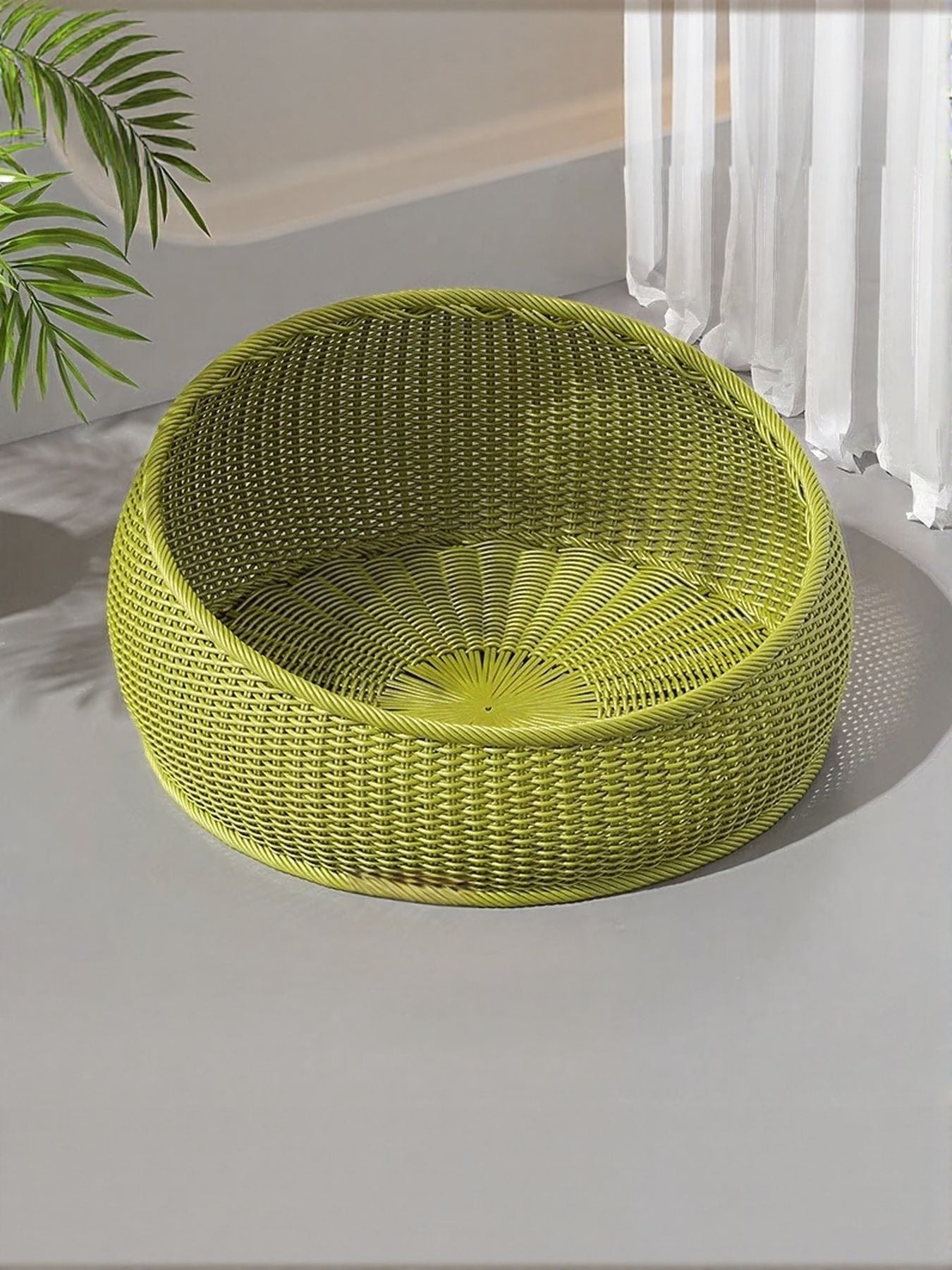 Green round woven rattan pet nest with plush cushion and ridged lining