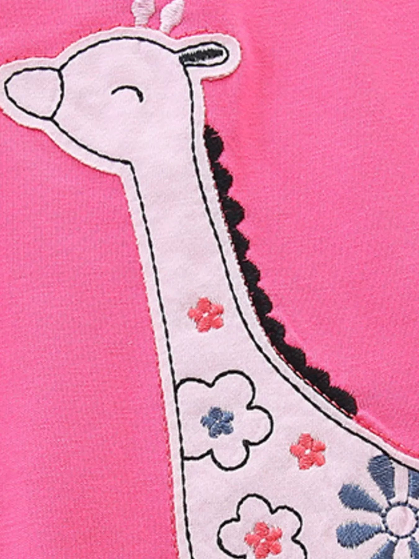 Giraffe applique patch on hot pink top with small flower and spotted details