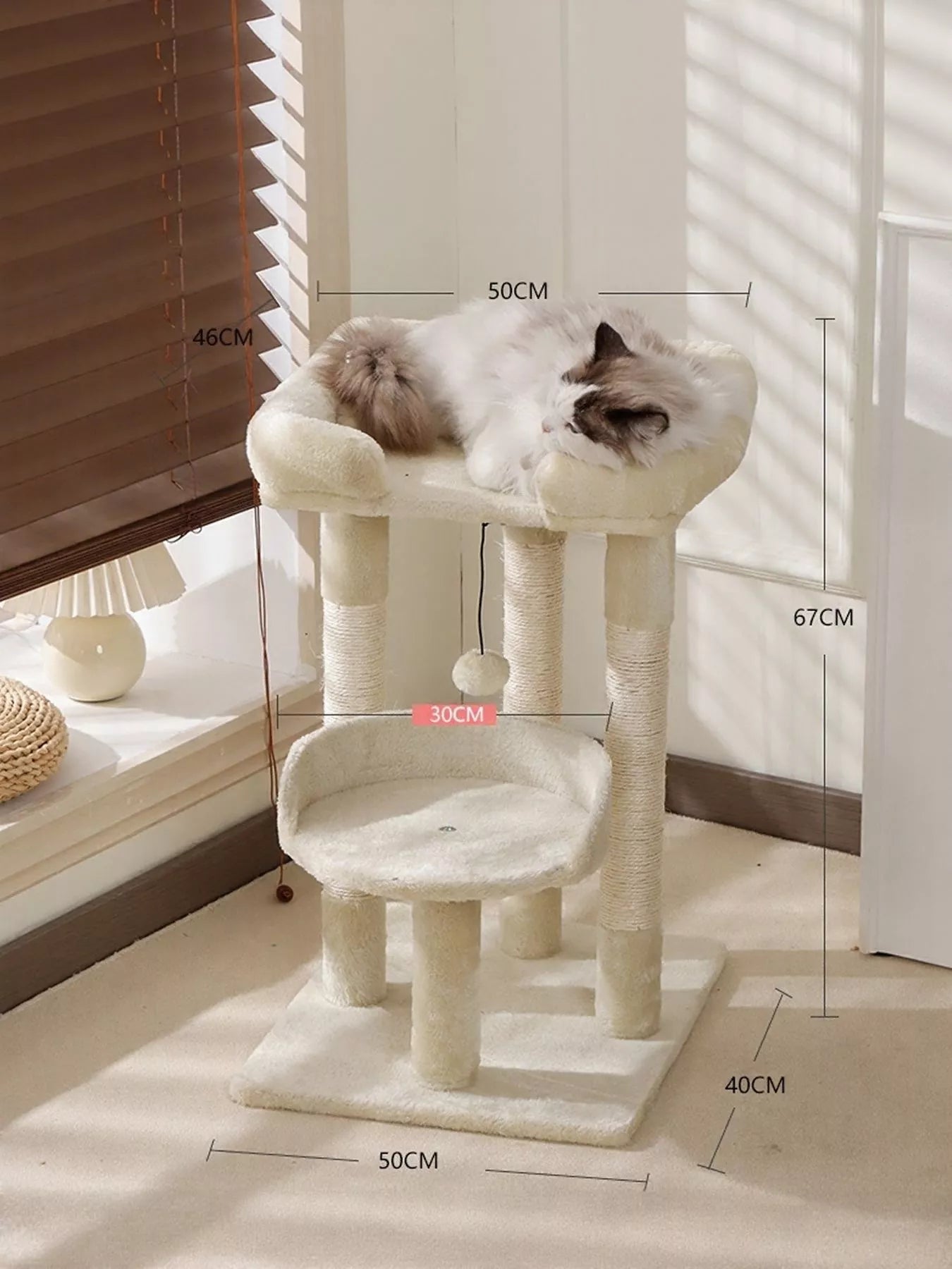 Plush cat tree condo with cream posts, top hammock perch, and sisal scratching circles