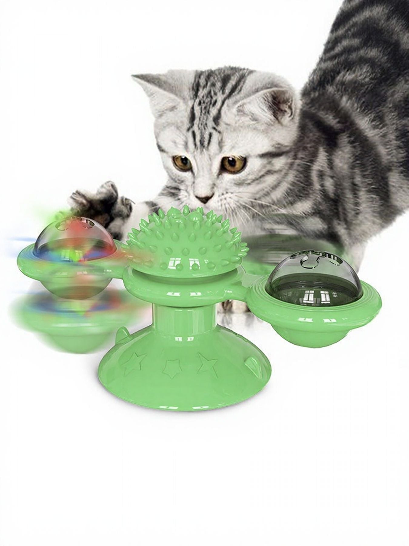 Green rotating cat toy set with suction cup domes and spiky wheel