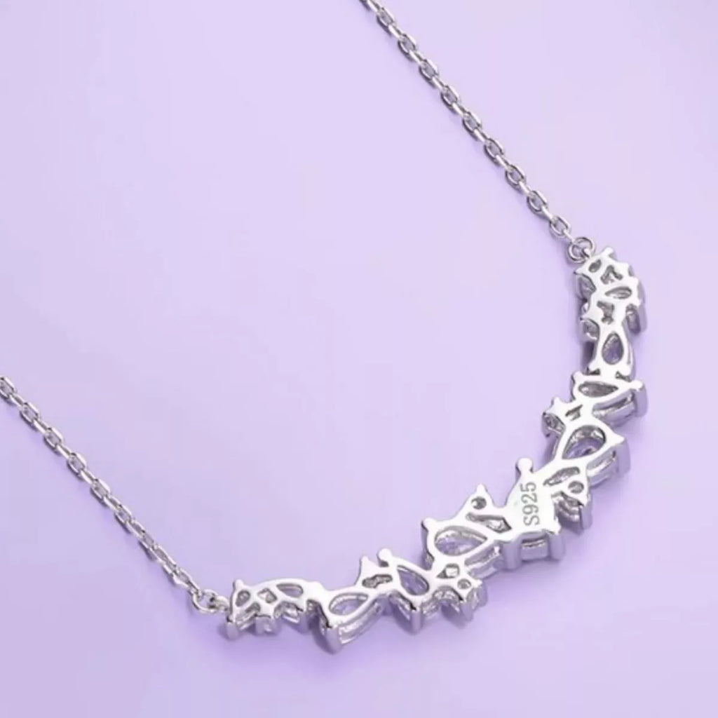 Silver 925 zircon necklace close-up of stamped row with small prong settings