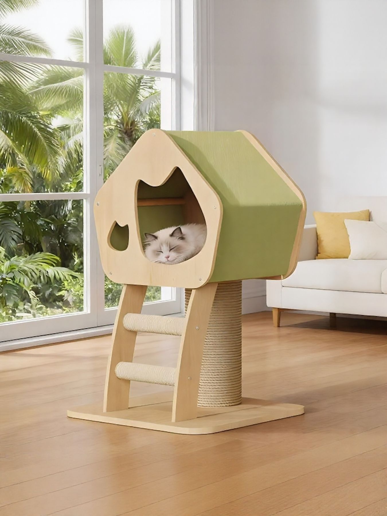 Wooden cat condo with green house and scratching post; cat inside the enclosed entry