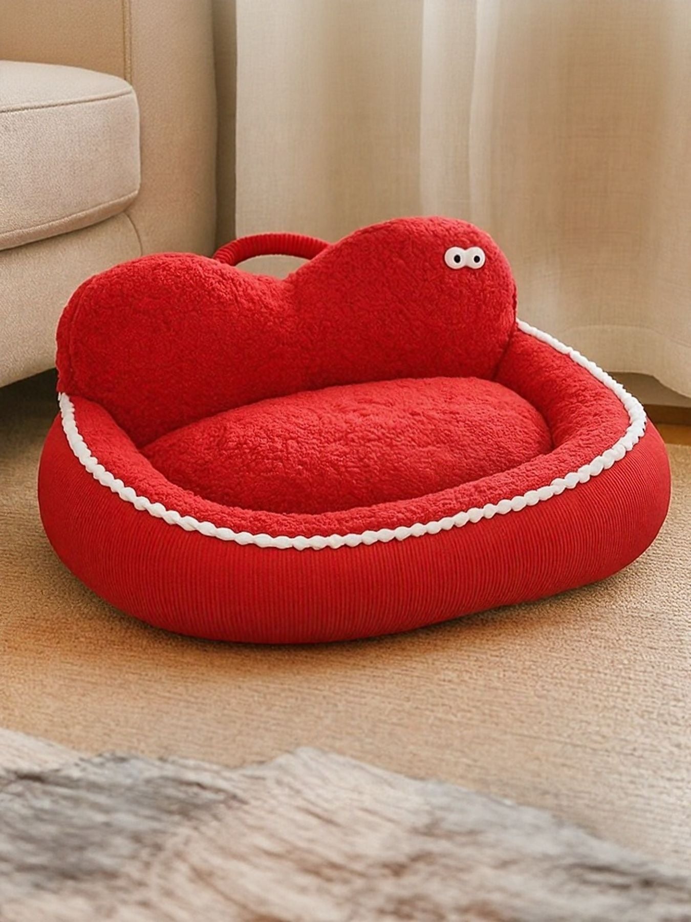 Apple-red cartoon pet nest with teddy face, plush interior, and handle