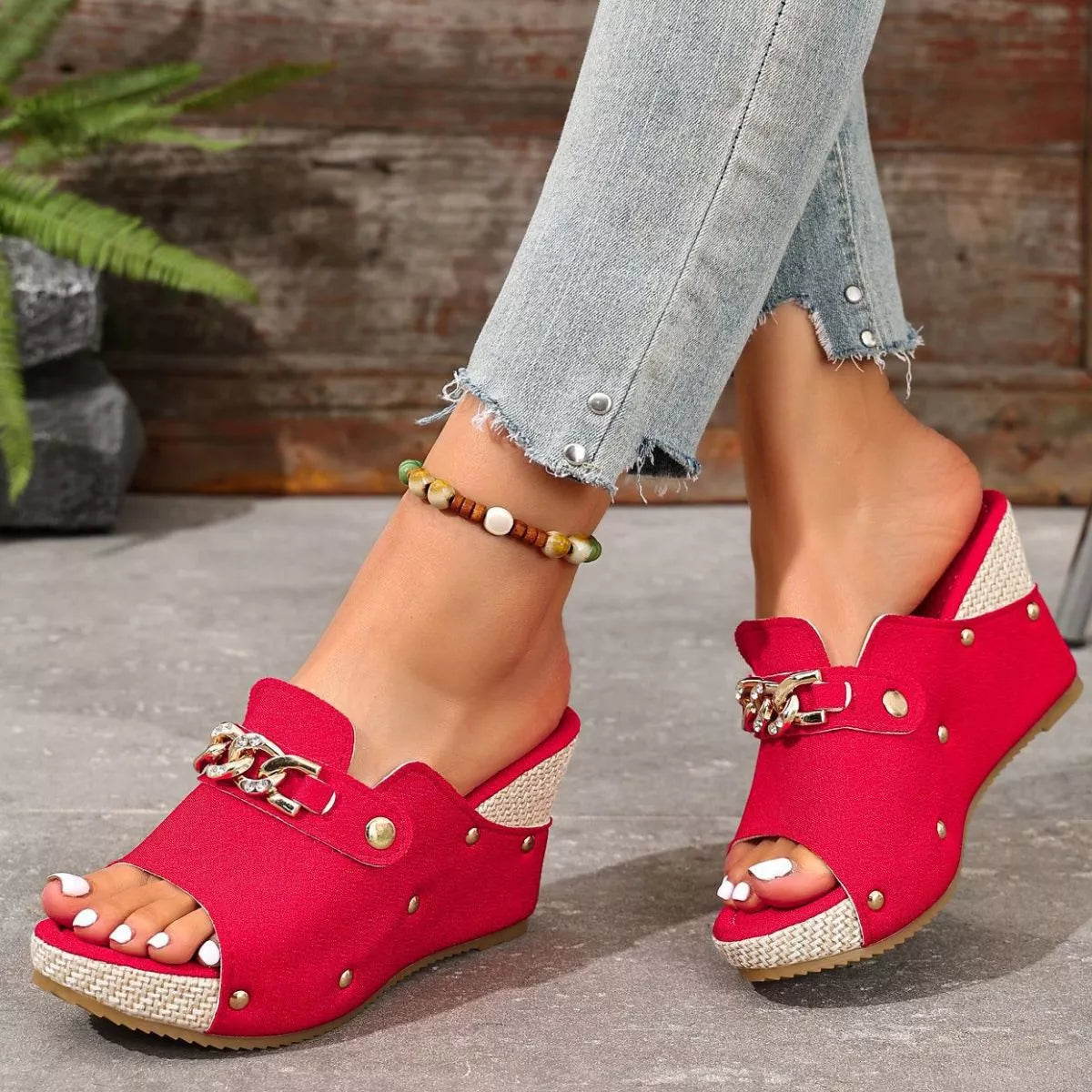 Rose red open-toe wedge sandals with stud accents and metal chain strap detail