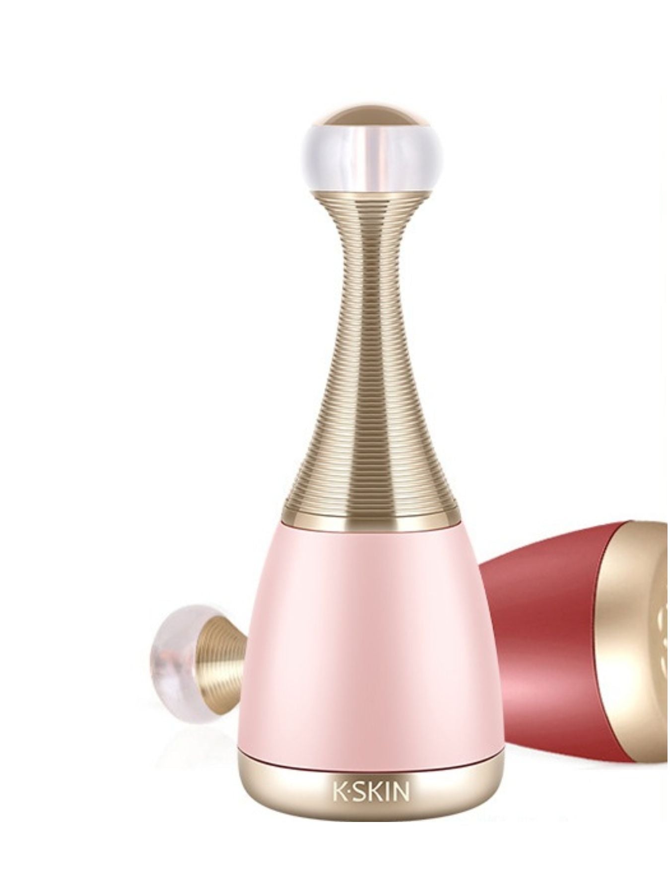 Blush pink facial steamer standing with silver-and-gold nozzle and side cartridge
