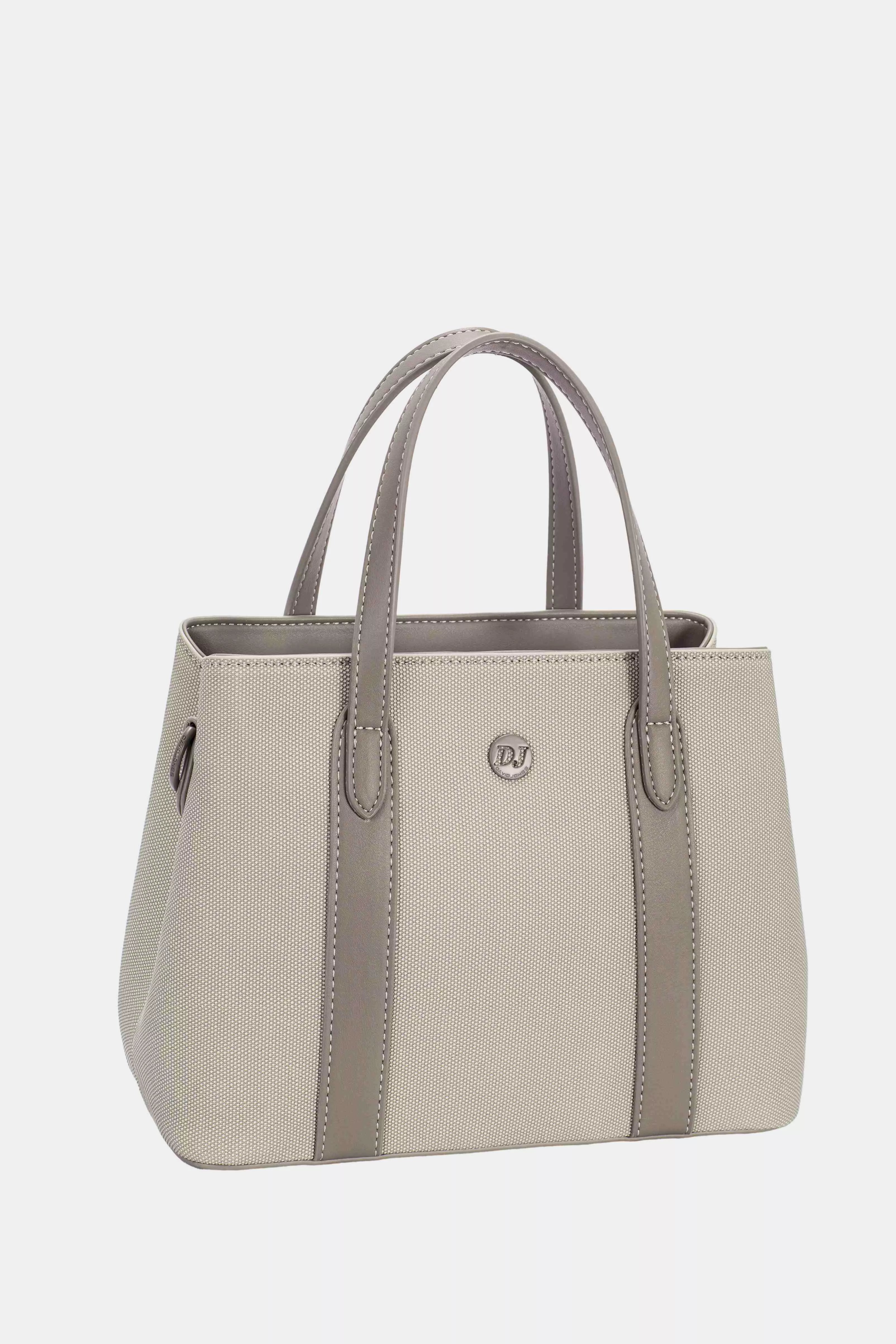 Warm taupe canvas tote with leather trim, side pocket detail and top handles