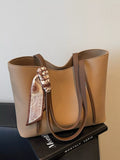 Khaki PU leather tote bag with matching handles and front scarf detail