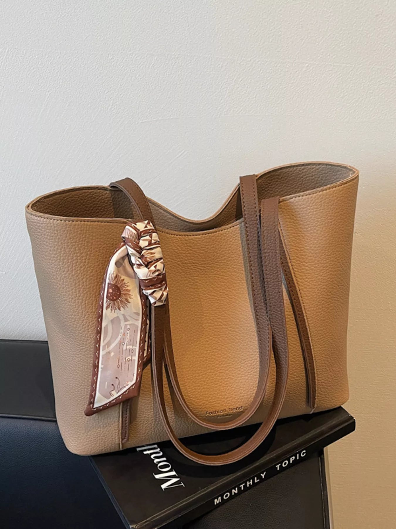 Khaki PU leather tote bag with matching handles and front scarf detail
