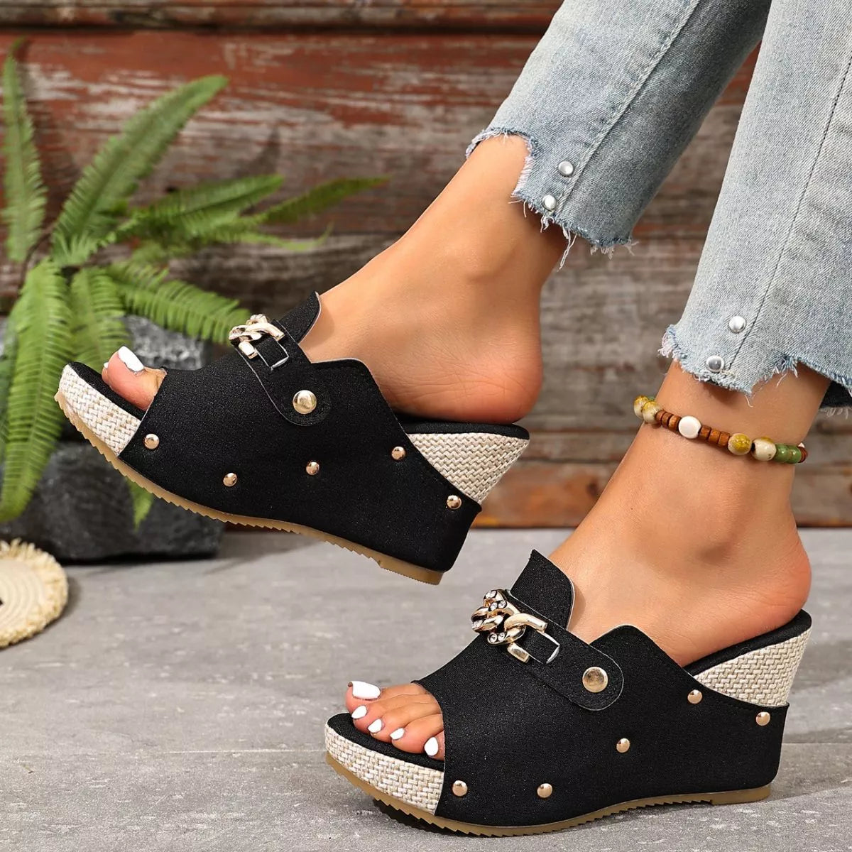 Open Toe Wedge Sandals in black: peep-toe wedge with studded straps and chain buckle