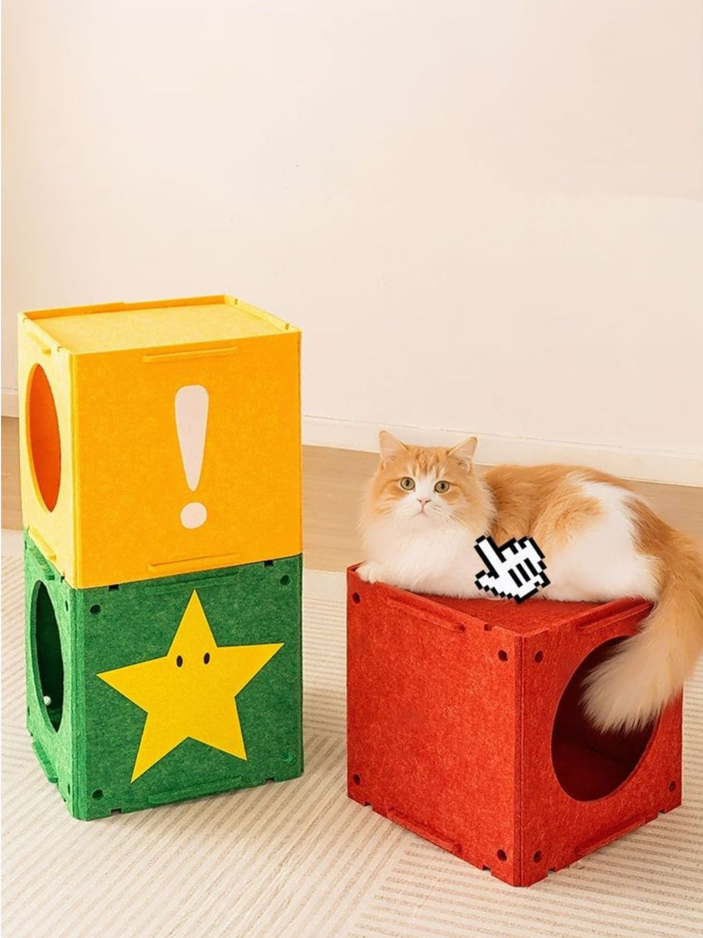 Interactive cat cube and tunnel houses with star and round entry holes; cat resting on red cube