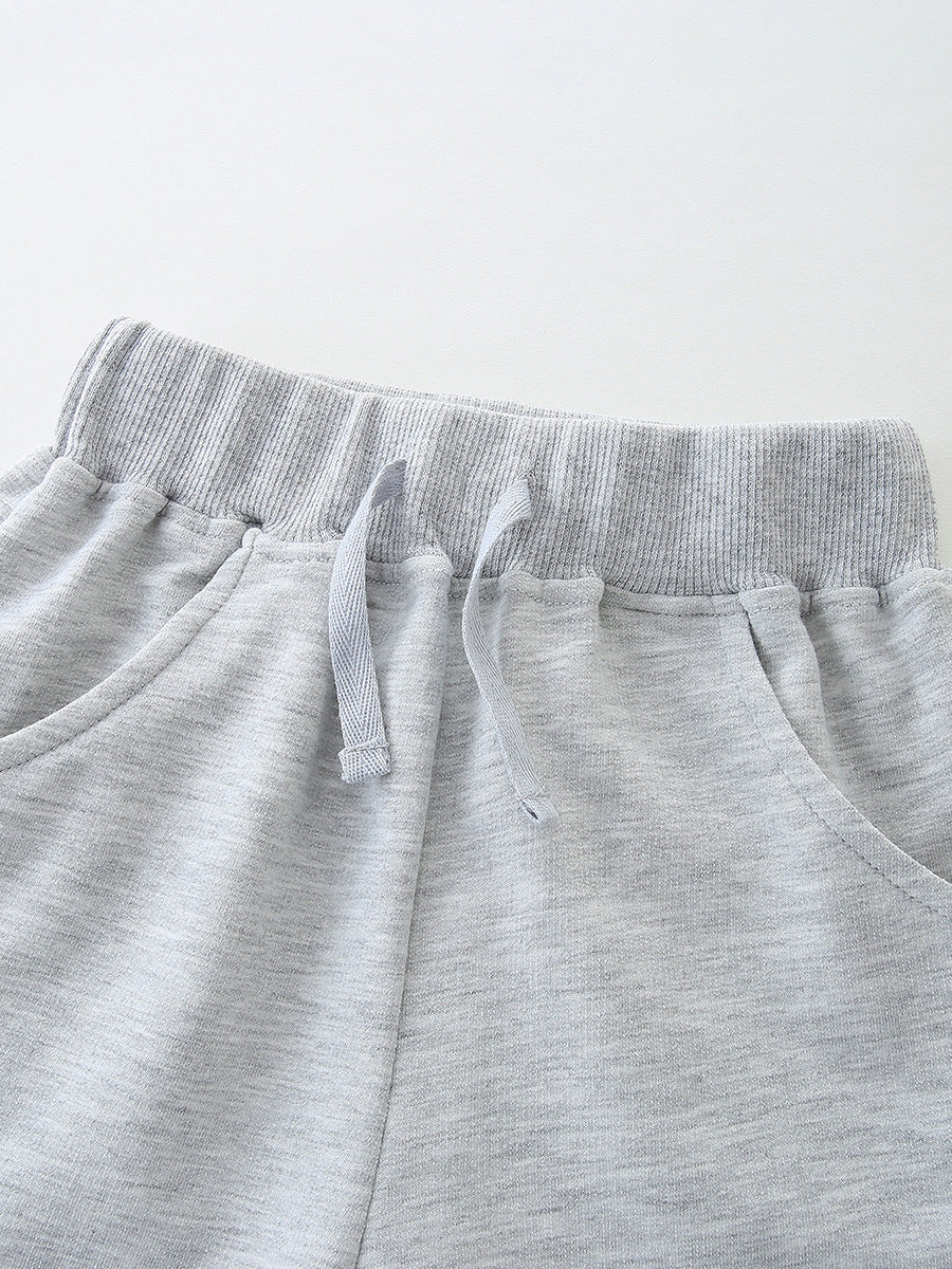 Light gray drawstring shorts with elastic waistband